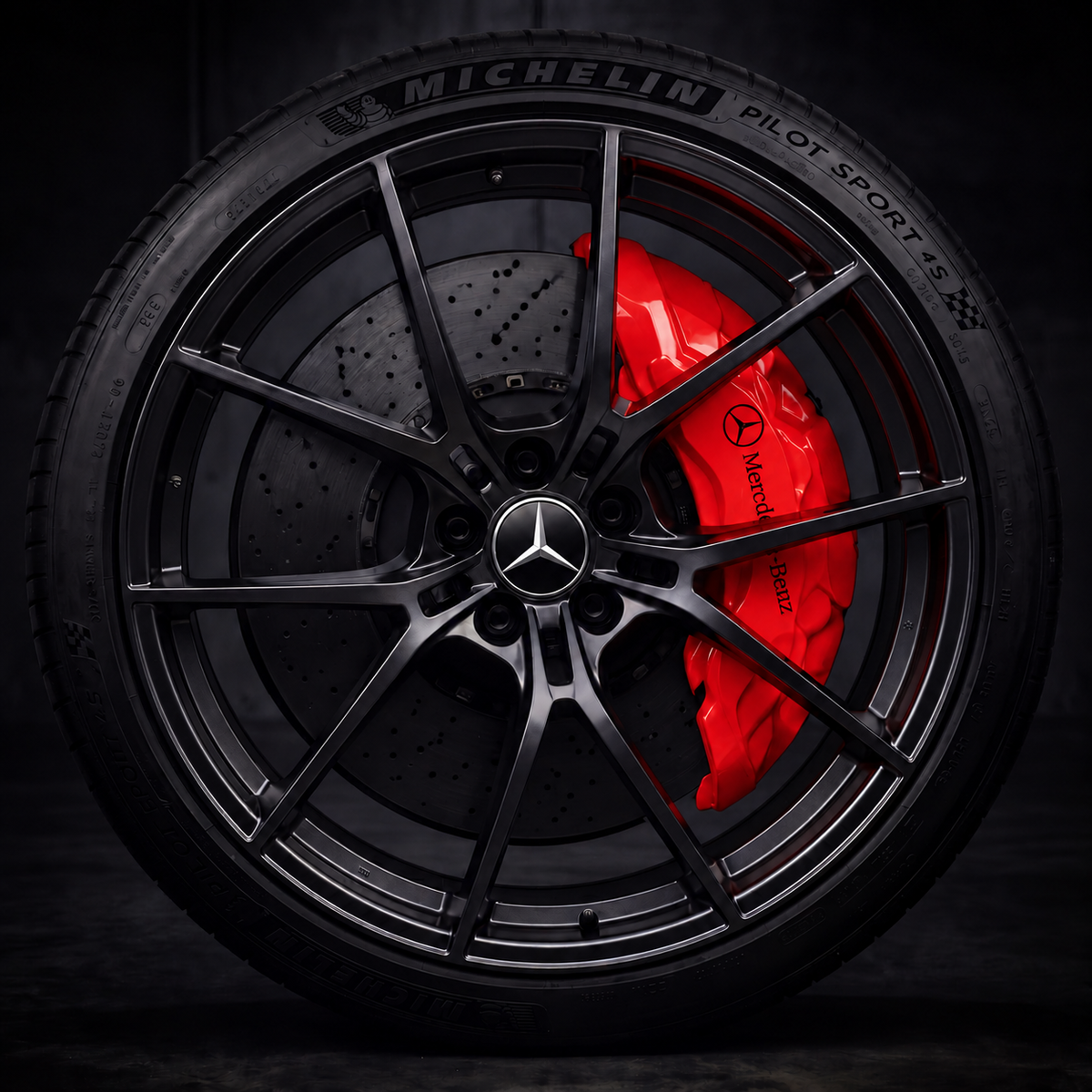 Mercedes-Benz caliper covers fitted over the factory calipers