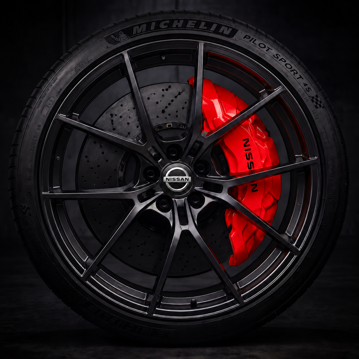 Nissan caliper covers fitted over the factory calipers